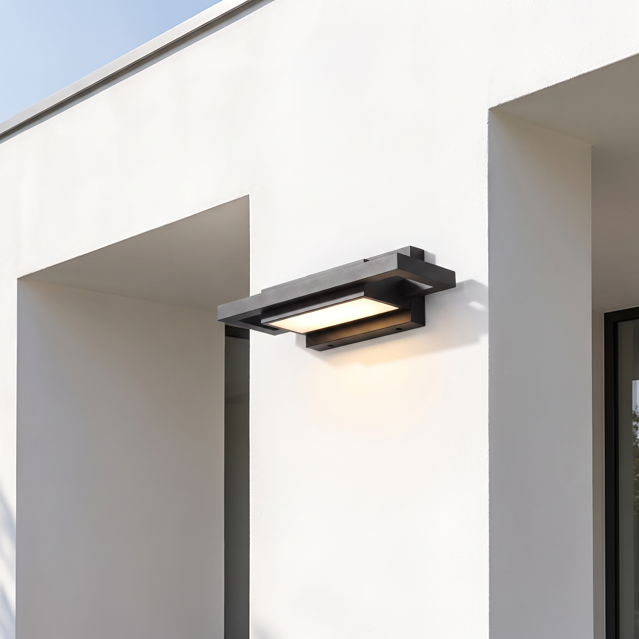 Brooklyn wall light on a modern render facade