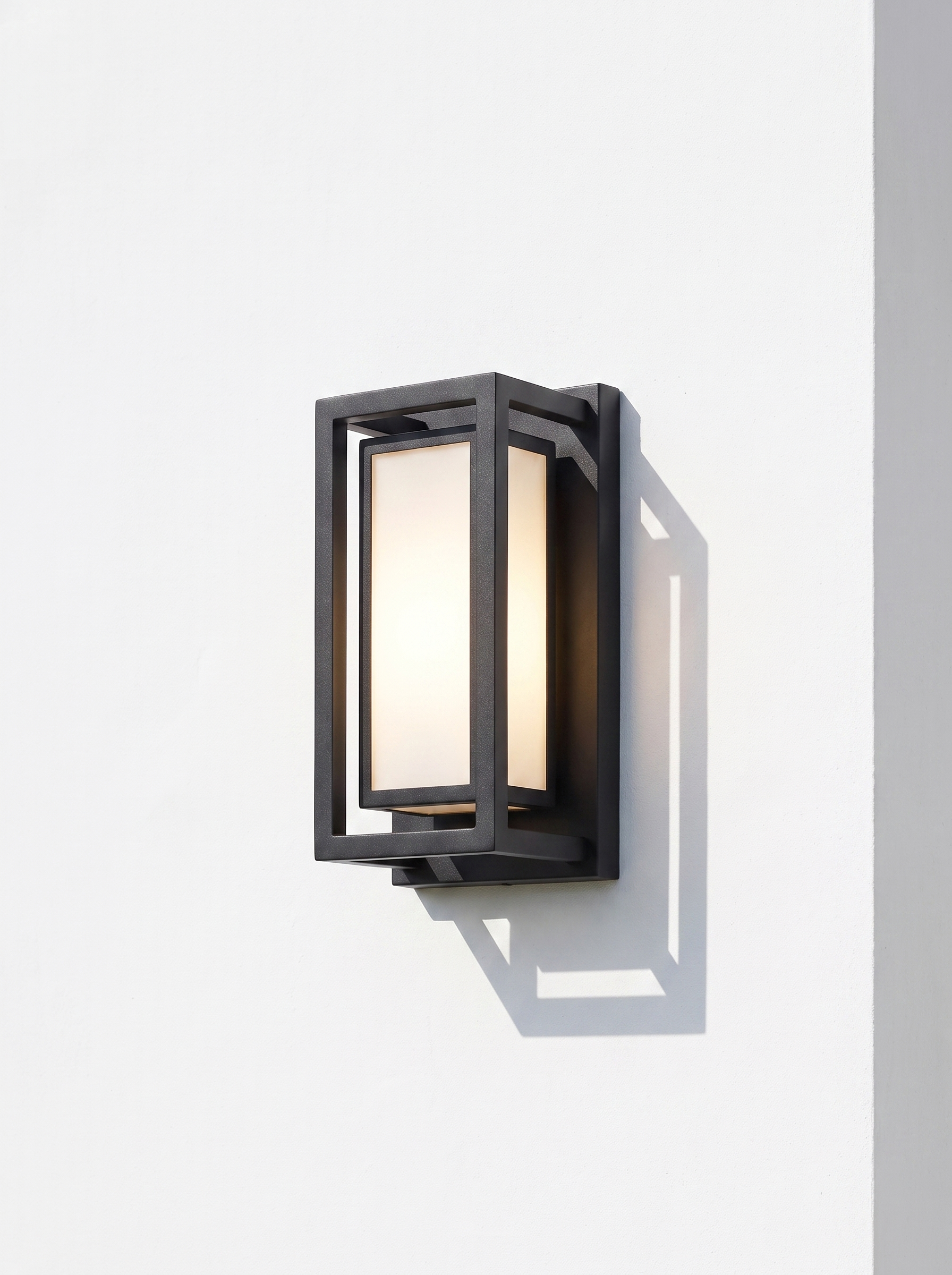 Brooklyn wall light on a white render facade