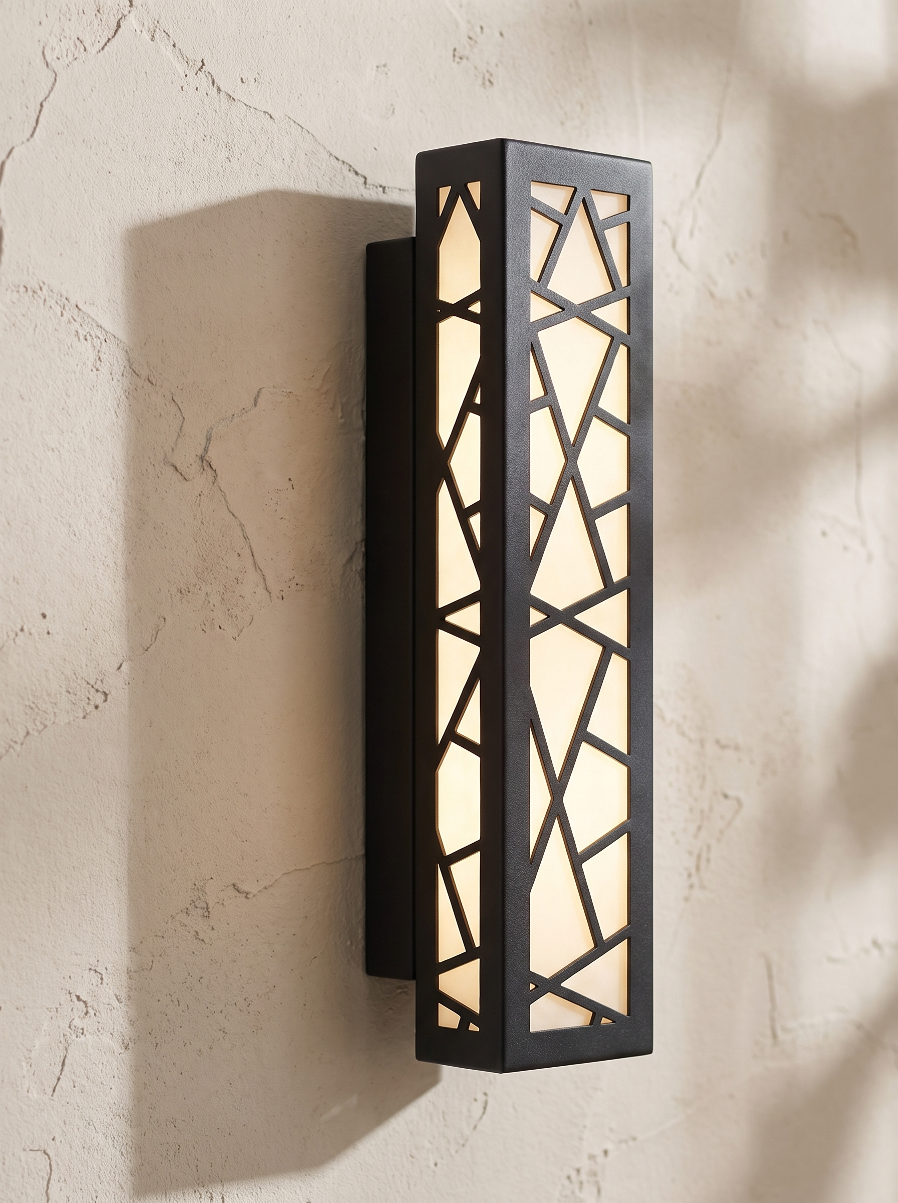 Harper wall light pattern cast on a wall